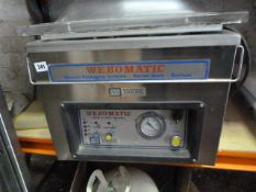 Webbomatic Vacuum Packaging System