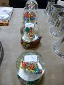 4 Snow Globes