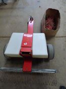 Tow Along Universal Lawn Maintenance Machine Comprising of Fertilize Spreader, Rake, Slitter and