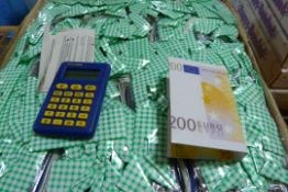 *Box Containing 100 Currency Converting Calculators