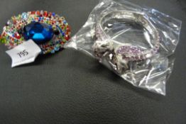 1 Costume Jewelry Ring and 1 Bracelet