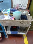 Table containing Assorted Funnels - Plastic Containers etc