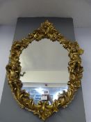 Ornate Gilt Framed Mirror with Cherub Embelishment