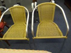 2 Wicker & Chrome Elbow Chairs