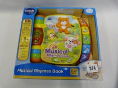 *VTECH MUSICAL RHYMES BOOK