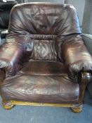 Wooden Framed Easy Chair in Faux Ox Blood Leather