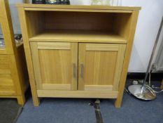 Sideboard Unit enclosed by Double Doors in Light Wood Finish