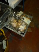 Galvanised Bin containing Curtain Pole Ends