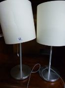 *Pair of Brushed Stainless Steel Lamps with Cream Shades