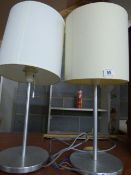 *Pair of Brushed Stainless Steel Lamps with Cream Shades