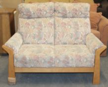 1 x Cintique “Hartford” 2-Seater Sofa -  Original RRP £1,199  – Floral Patterned Upholstery On A