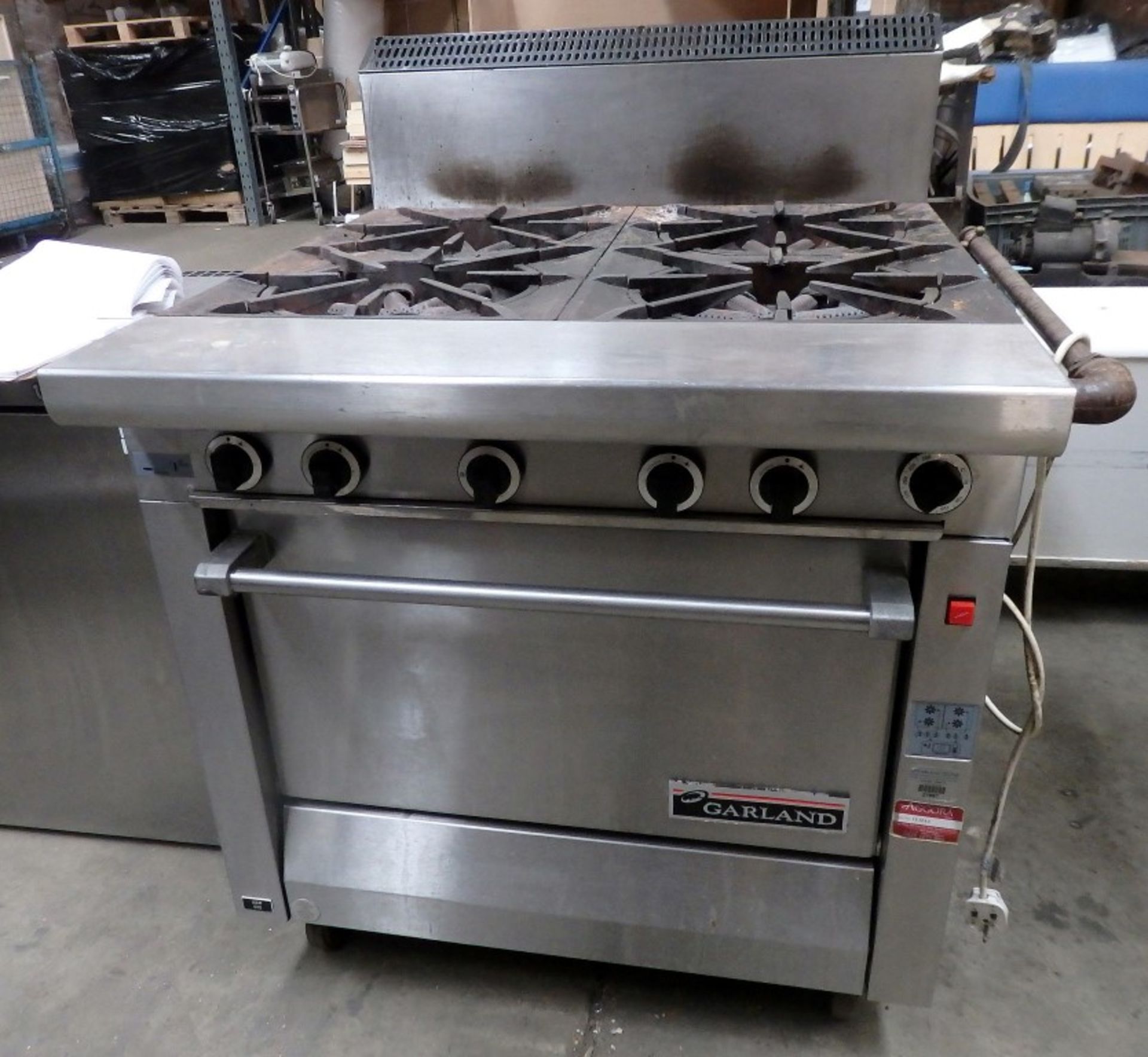 1 x Garland Commercial Range Cooker - Four Gas Burners - On Castors - Suitable For Professional