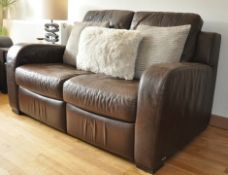 1 x Natuzzi Brown Leather – 2 Seater Reclining Sofa With Complimentary Cushions – Immaculate