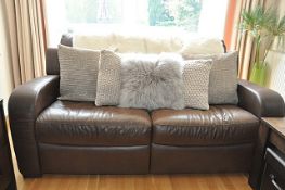 1 x Natuzzi Brown Leather – 2 Seater Reclining Sofa With Complimentary Cushions (Fur throw not