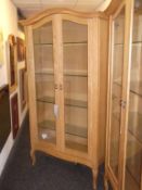 1 x Bentley 'Amore' Oak Illuminated Display Cabinet - 2-Door With Glass Shelves & Light- Ex