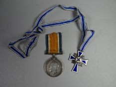 A Third Reich Nazi silver Mother's Cross with 1938 date mark together with a WWI British War Medal