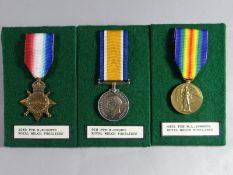 Three WWI medals consisting of a 1914-15 Star to 3248 Pte. R. Roberts, R.W.F., a War Medal to 910