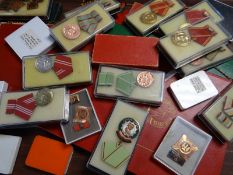 A comprehensive archive of medal certificates and warrants relating to an individual in the East