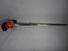 A Scottish basket-hilted sword by Wilkinson with scabbard and dedicated blade to 'Col. R.D. Renick