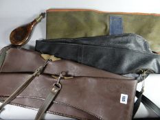 Three soft rifle carrying cases together with a leather and brass shot flask