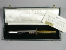A presentation Fairbairn-Sykes Fighting Knife Ltd Edition (75/100) in case of issue with gold-