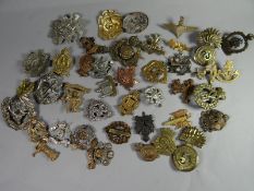 Forty-two assorted British and World military badges