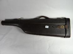 A leg of mutton shaped leather gun case with buckle