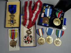 Eight assorted World decorations and medals, some in boxes of issue