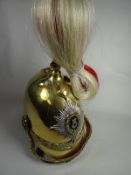 An 1871 Pattern 5th Dragoon helmet complete with horsehair plumage and chin scales
