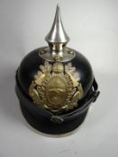 An Imperial German Fire Service pickelhaube with leather lining still with original outfitter's