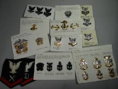 A parcel of US Navy badges and insignia