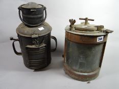 Two ship's lamps one by Meteriorite and numbered 66199, the other with a 'D' triangular logo and