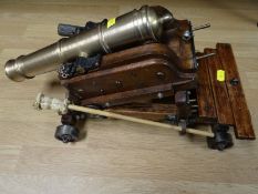 A miniature brass replica of an eighteenth century 24-pounder cannon