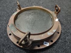An early twentieth century ship's brass porthole, 18ins (46 cms) diameter