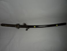 A Japanese-style katana in lacquered scabbard with complete fittings