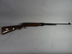 A Webley Mk III air rifle .22 calibre with polished wooden stock with Webley stud with barrel marked