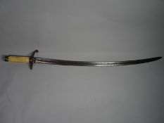 An ivory-handled cutlass with curved blade, 25 ins (64 cms) blade length