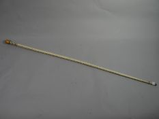 A captivating native segmented believed whalebone walking stick cane 32.5 ins (83 cms)