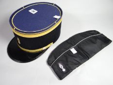 A French police kepi marked 'Balsan' together with a French police side cap