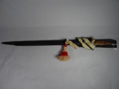 A German thin bayonet with blade marked 'FrFurt' and wooden wrap-around grip, frog and portepee