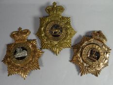 Three helmet plates for East Lancashire, Royal Lancaster and Royal Berkshire Regiments