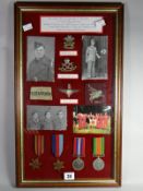 A framed group of medals consisting of 1939-45 Star, Burma Star, WWII Defence and War Medals,