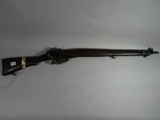 A 303 Lee Enfield bolt-action rifle with Canadian markings complete with deactivation certificate