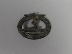 A Kriegsmarine U-Boat Breast Badge instituted in 1939 by Grand Admiral Eric Raeder and awarded to