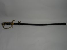 A German Kinder Sabel (child's sword) with lion head pommel, cross-swords motif, foliate engraving
