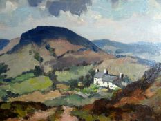 GYRTH RUSSELL oil on board - cottages on hillside with mountains in background, 11.5 x 16.5 ins (
