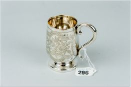 A silver mug with bright cut floral decoration, 3.5 ozs, Birmingham 1891
