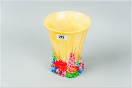 A Clarice Cliff Bizarre vase in the 'My Garden' pattern, a predominantly yellow ground waisted
