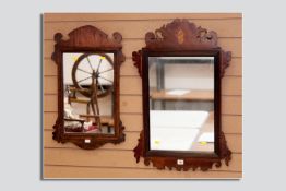 A Georgian mahogany scrollwork mirror, the top having a Sheraton style inlaid shell motif, 31.5 x 21
