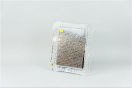 A Waterford crystal portrait frame, slightly shaped with a wheel cut diamond and drop pattern to the